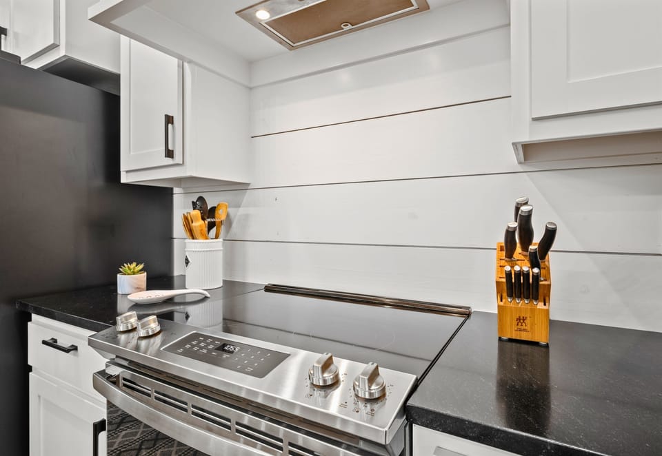 Sleek appliances and generous counter space give you plenty of room to prep, serve, and enjoy meals together.