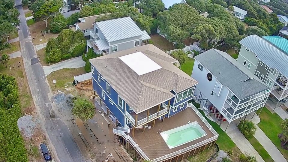 Aerial view of home, still under construction, completion 10/2026