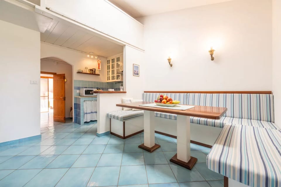 Apartment, 1 Bedroom, Patio, City View | Dining room