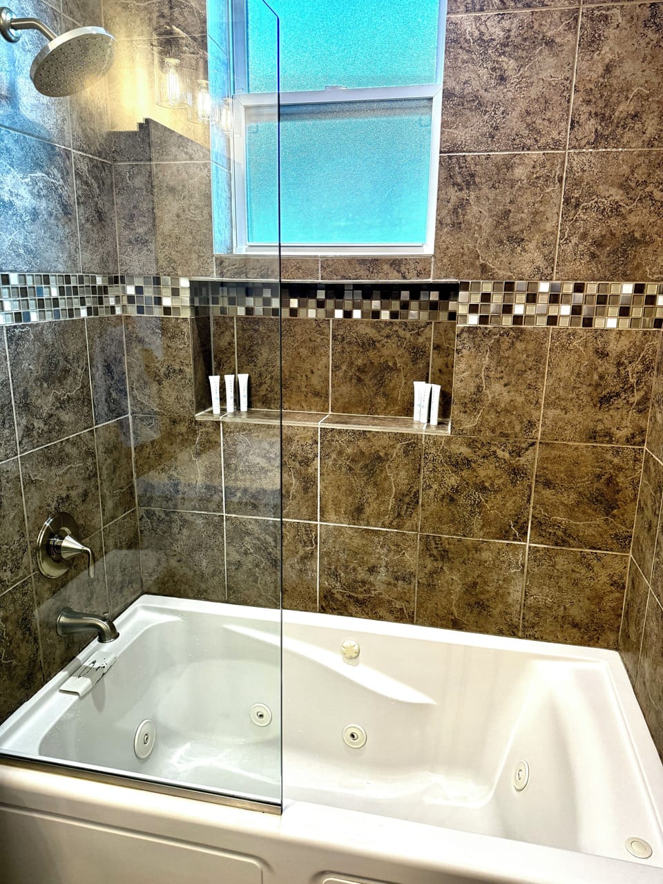 Jetted tub w/ bubble bath to relax and recharge. Hair dryer for your convenience