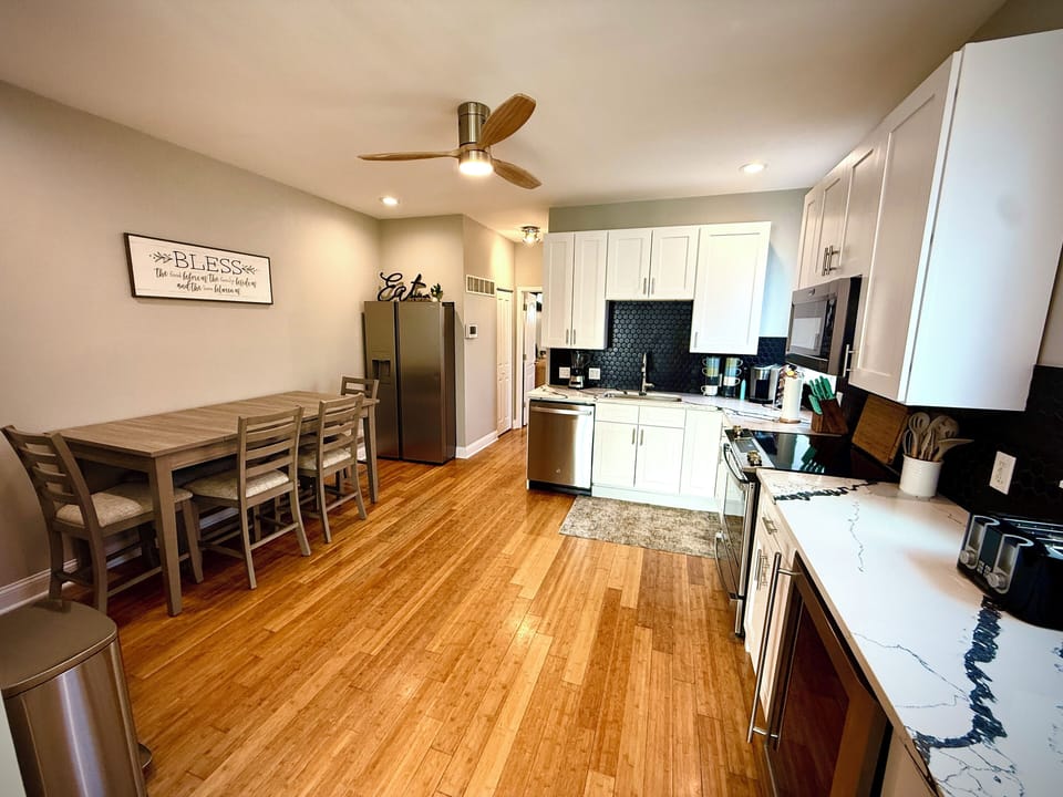 All major appliances including Kuerig, Airfryer, baking items, and a wine fridge