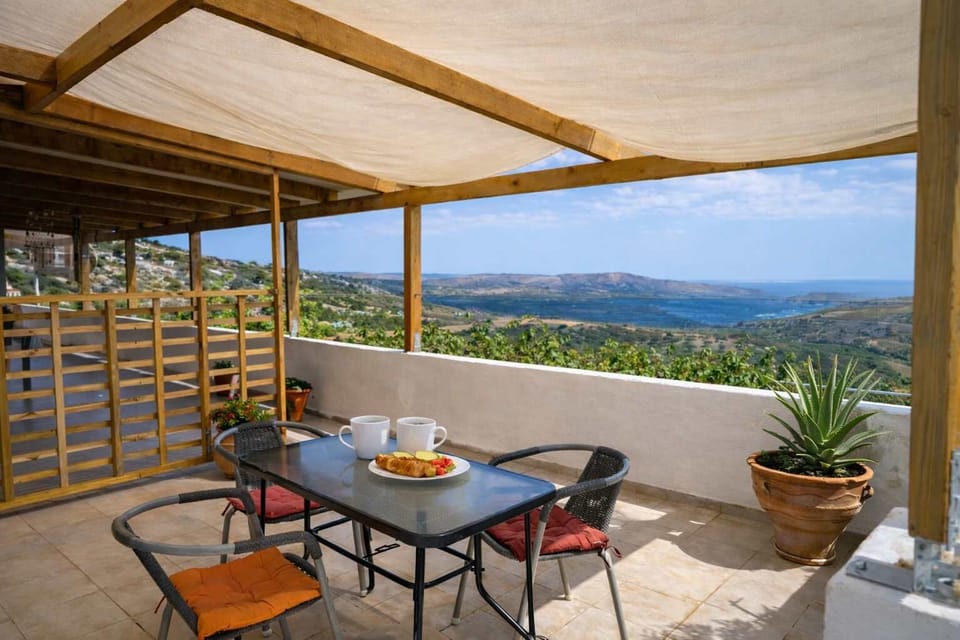 Shaded terrace with open views over the countryside and sea