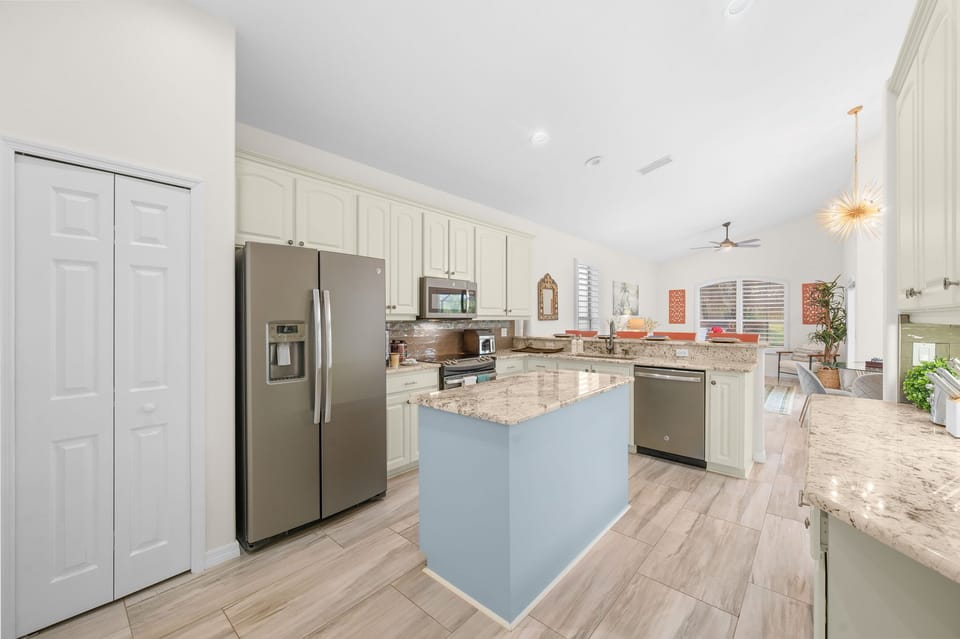 Bright, full kitchen perfect for cooking meals together.