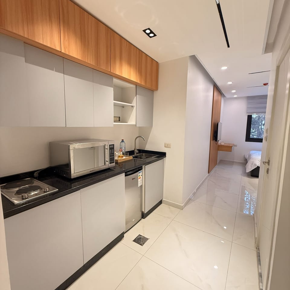 Deluxe Double Room, Garden View | Private kitchen | Mini-fridge, microwave