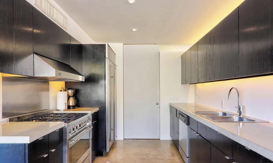Gourmet kitchen with professional-grade appliances, ready for any culinary adventure.