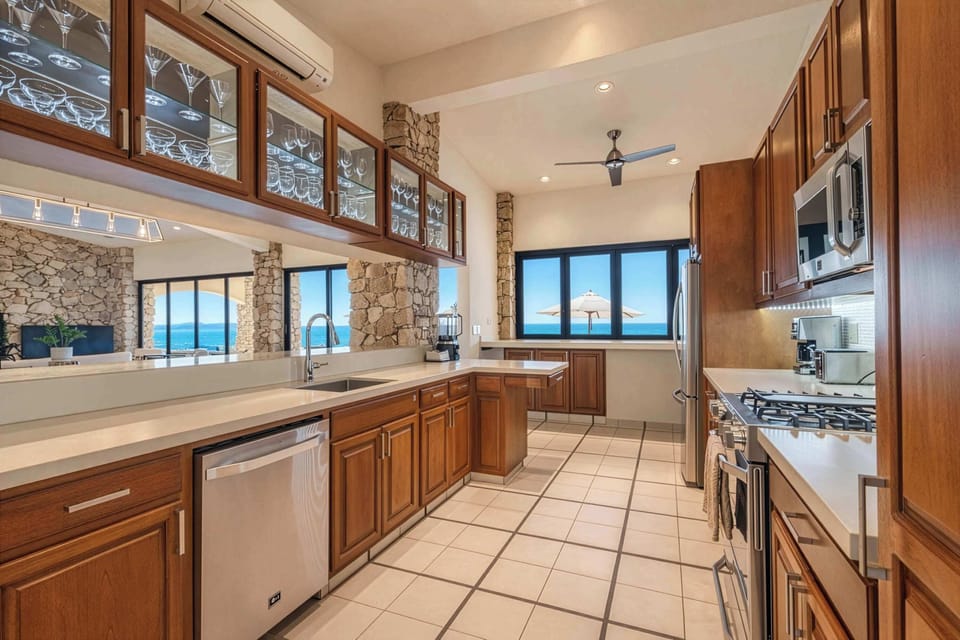 Fully-equipped gourmet kitchen with premium appliances & ocean views
