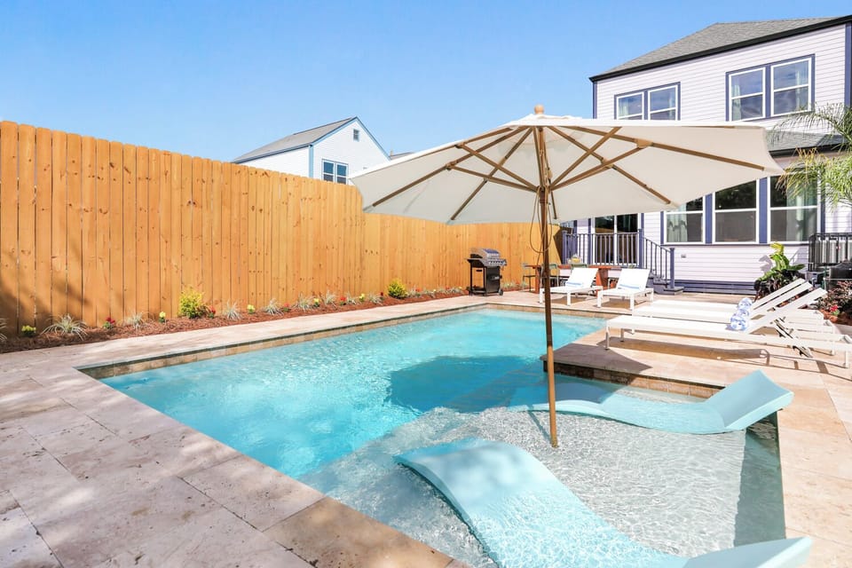 heated pool with loungers 