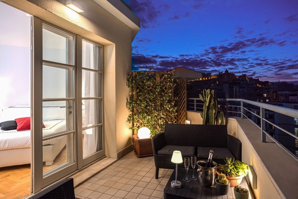 Deluxe Double Room, City View | In-room safe, blackout drapes, soundproofing, iron/ironing board