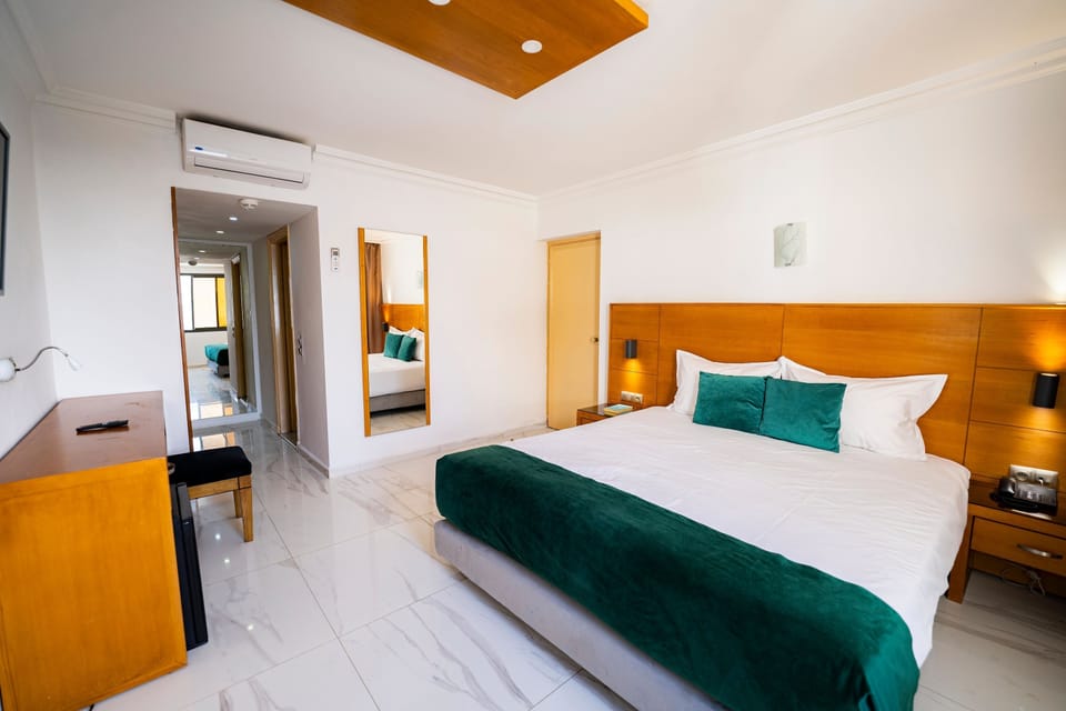 Family Suite, 2 Bedrooms | Premium bedding, minibar, in-room safe, individually decorated