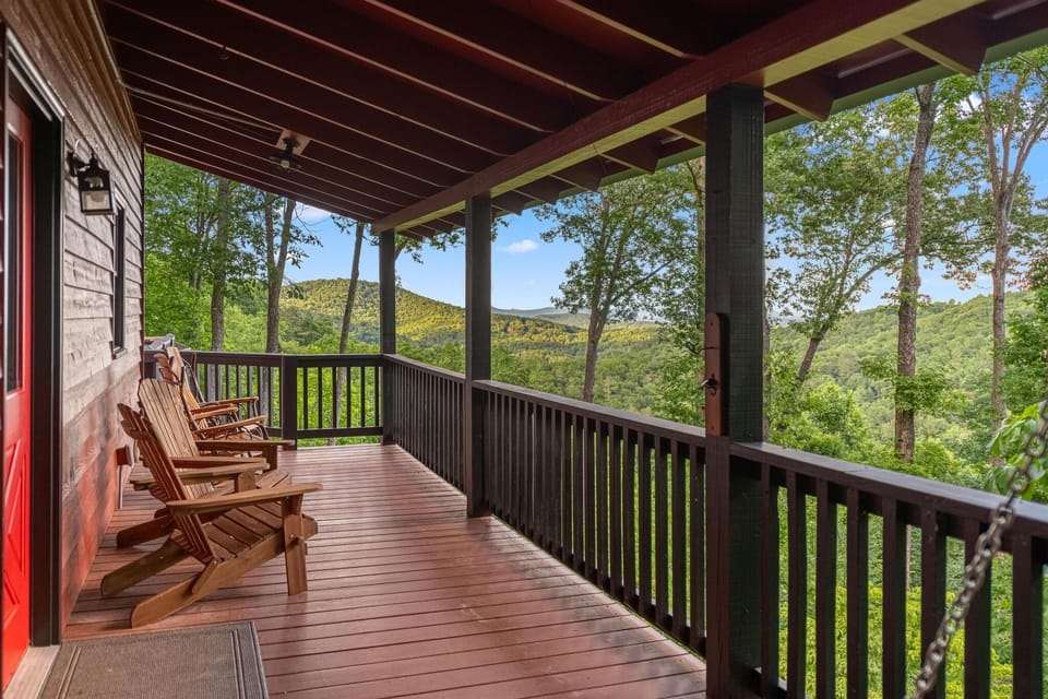 Private covered porch with rocking chairs and incredible views