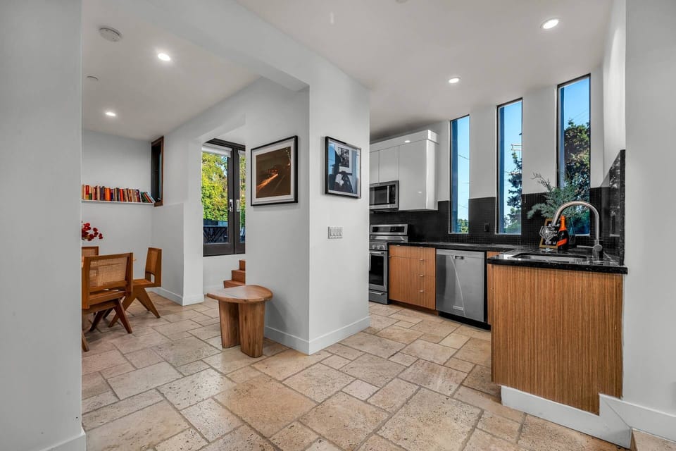 Cook and socialize in this seamless open floor plan. Private and separate Guest Entrance.