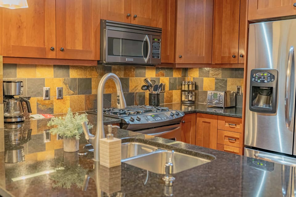 Chef's kitchen complete an elegant gas range