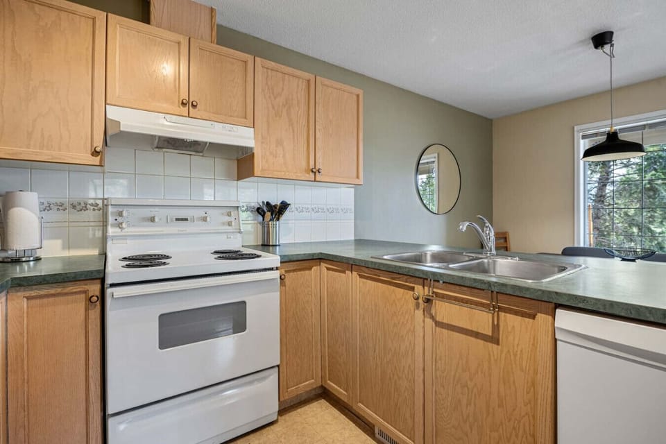 Main floor kitchen with a drip coffee maker, ground coffee, tea, sugar and basic condiments (ketchup, mustard & relish.)