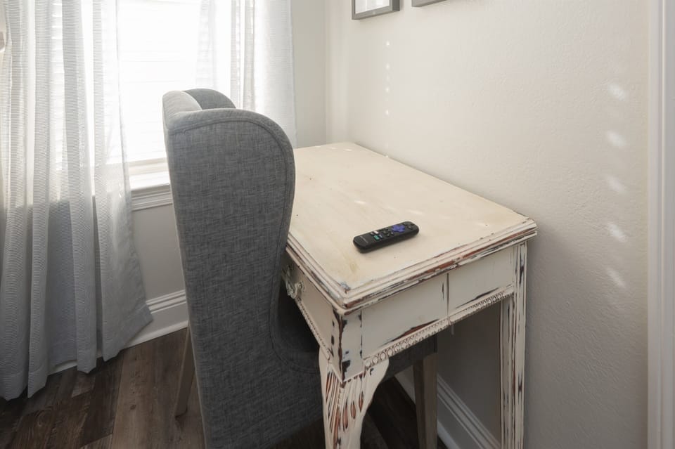 Dedicated desk nook perfect for remote work or planning the day.