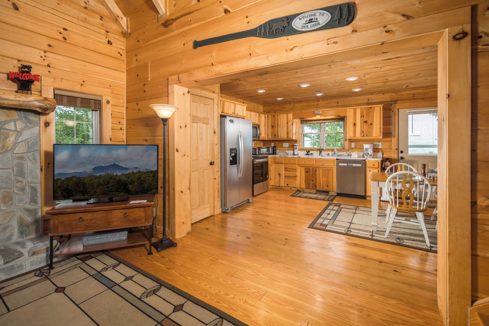 Open kitchen with stainless steel appliances and a spacious layout
