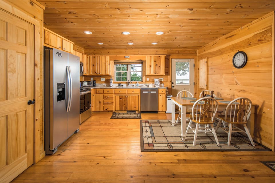 Open kitchen and dining area with seating for family meals