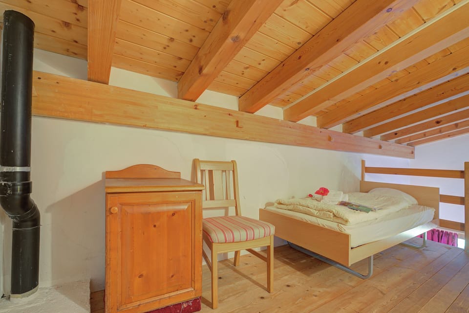 Bed on the mezzanine floor