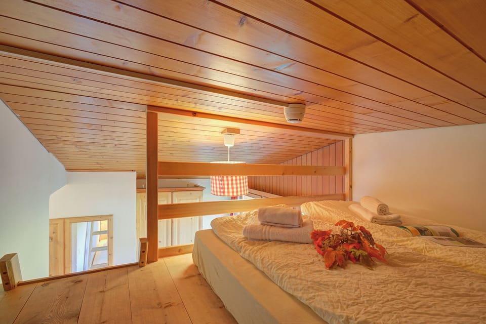 Bed on the mezzanine floor