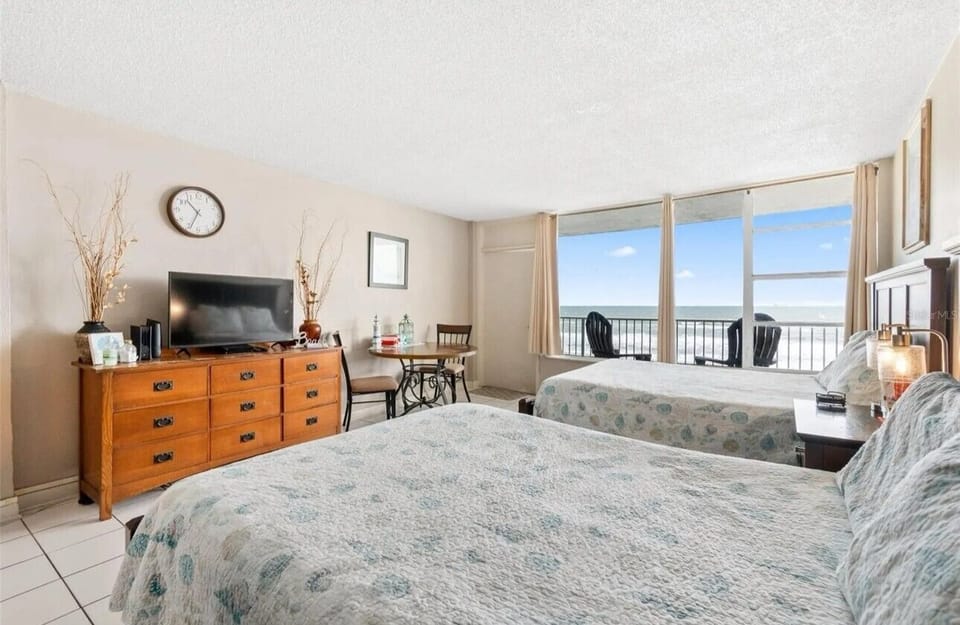 Ocean views & two queen beds, your perfect escape.