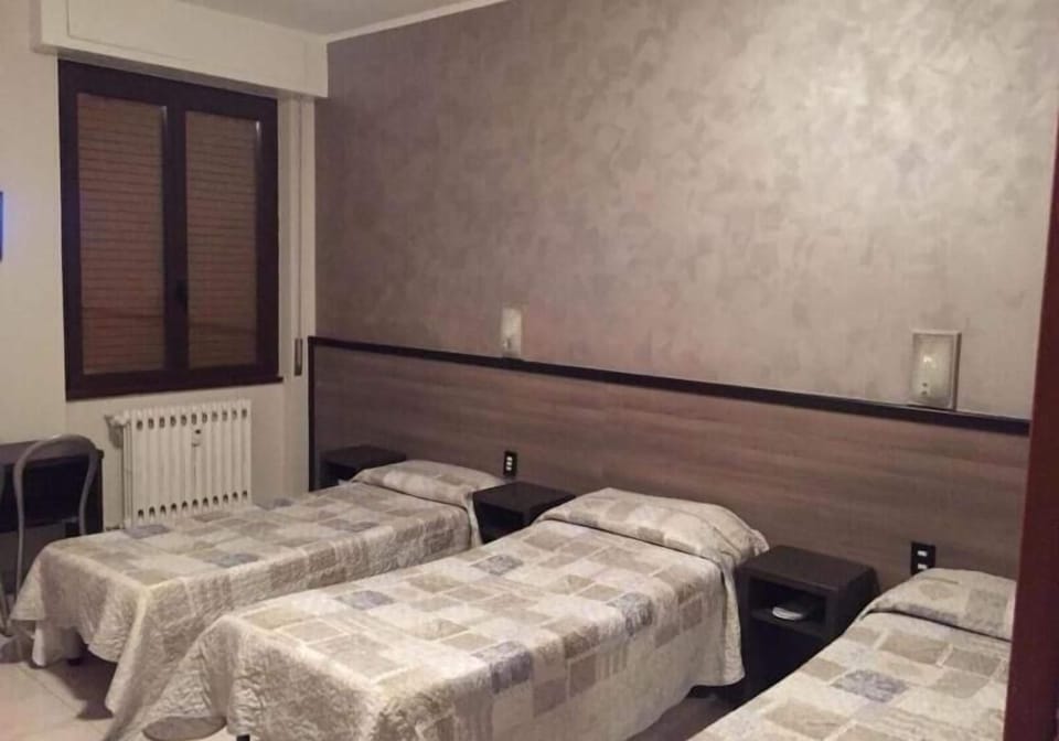 Classic Triple Room, Balcony, City View | Desk, laptop workspace, free WiFi
