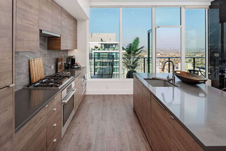 Kitchen with stainless steel appliances and a modern sink area.