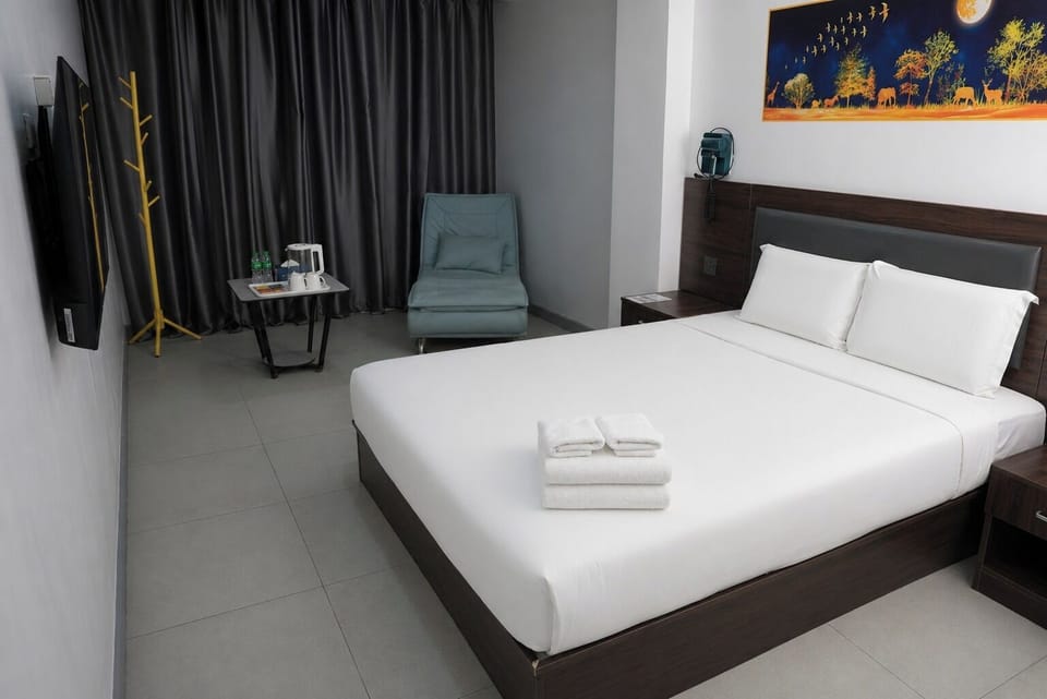 Deluxe Single Room | Premium bedding, desk, laptop workspace, free WiFi
