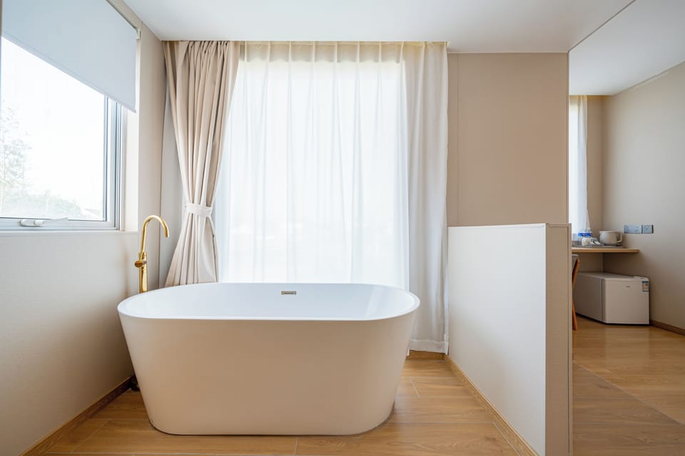 Senior Twin Room, Courtyard View | Laptop workspace, free WiFi