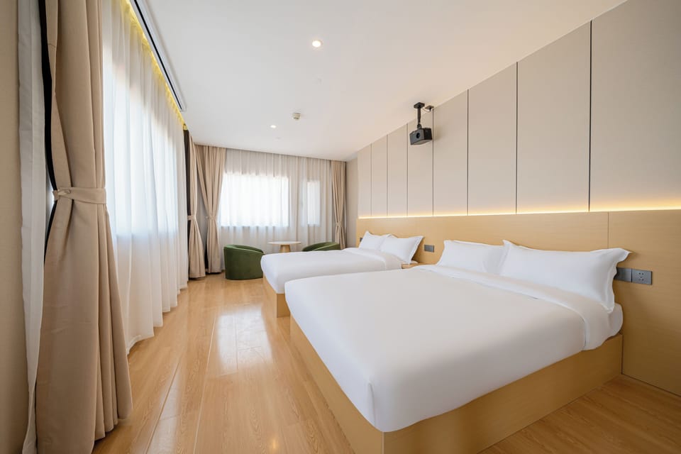 Senior Twin Room, Courtyard View | Laptop workspace, free WiFi