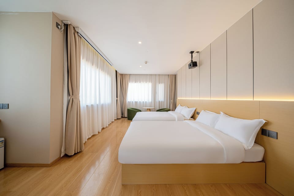 Senior Twin Room, Courtyard View | Laptop workspace, free WiFi