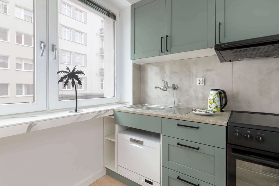 The kitchenette's practical layout maximizes space and functionality.