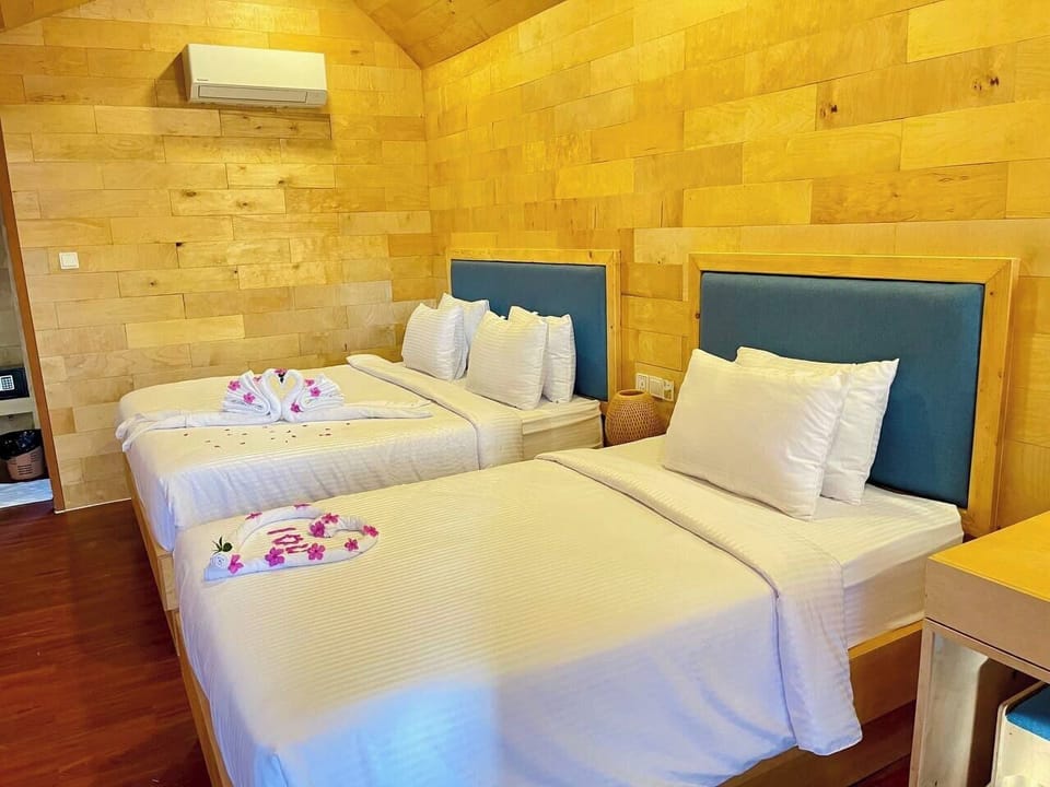 Deluxe Twin Room, 2 Bedrooms, Balcony | In-room safe, iron/ironing board, free WiFi