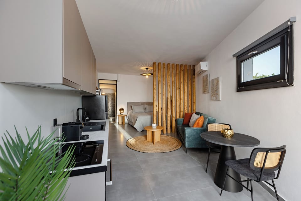 Junior Apartment, Patio, Sea View | Living area | TV