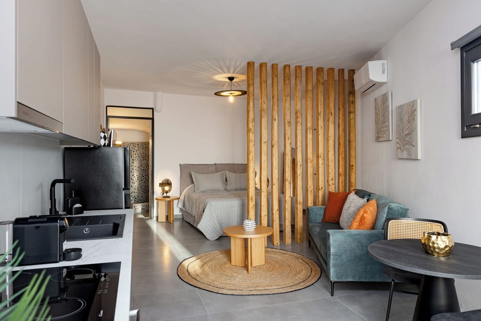 Junior Apartment, Patio, Sea View | Living area | TV