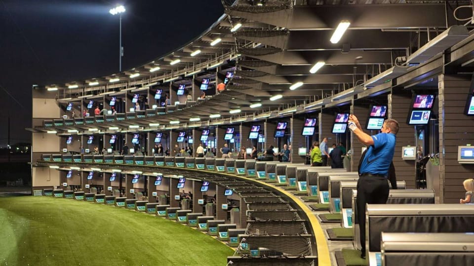 Top Golf is a sprawling entertainment venue with a high-tech driving range &amp; swanky lounge with drinks &amp; games.