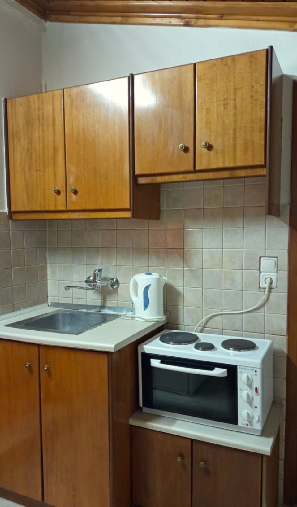 Fully equipped kitchenette with everything needed for light cooking and convenience.