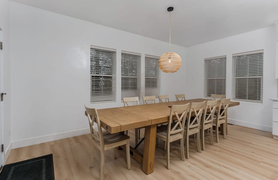 Large dining table with seating for 10.