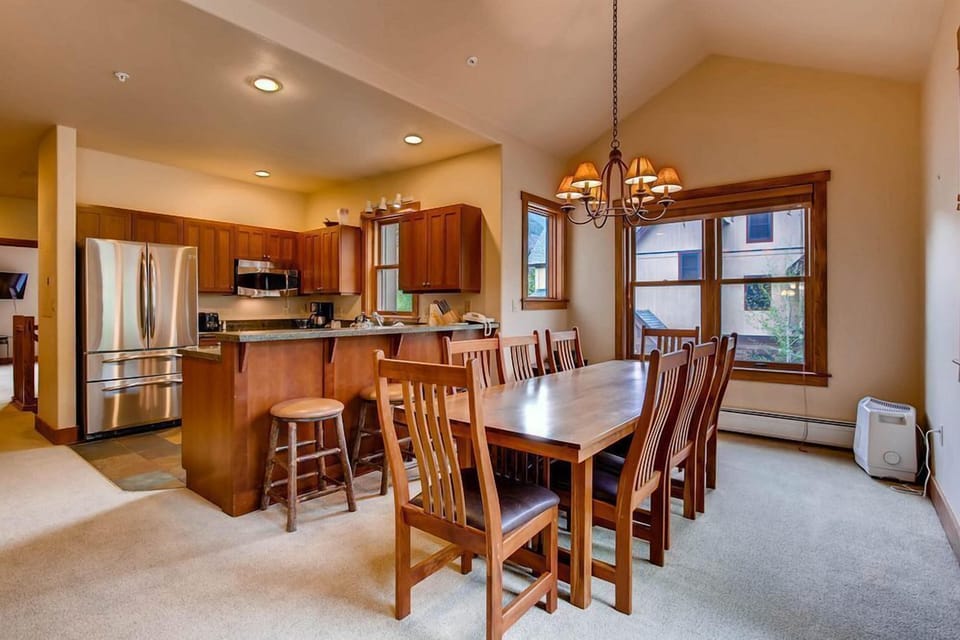 Step into a spacious kitchen that seamlessly connects to the dining space, perfect for family gatherings.