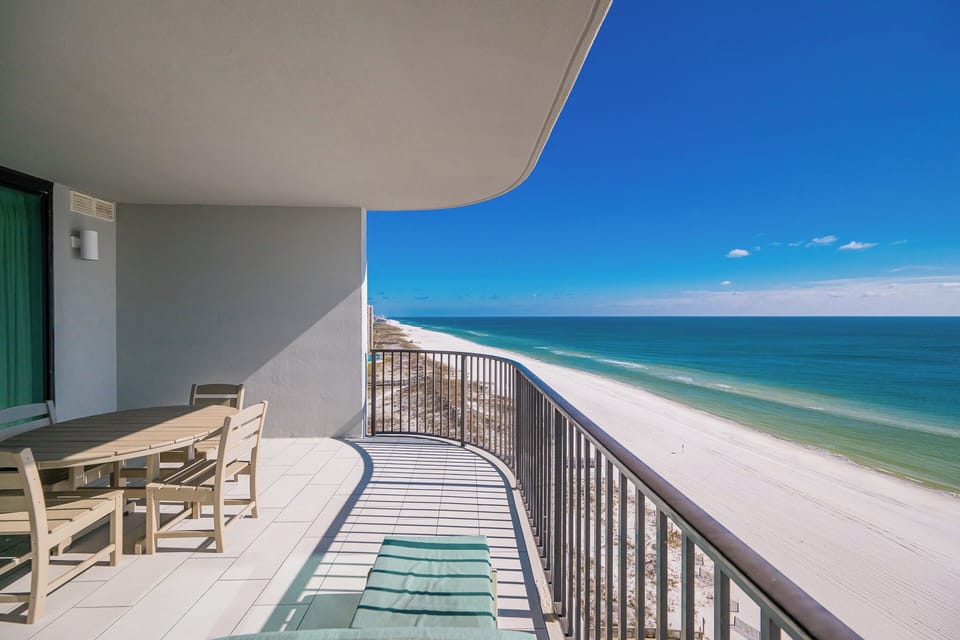 Your balcony invites you to watch waves roll along the beach while you lounge or share meals outdoors