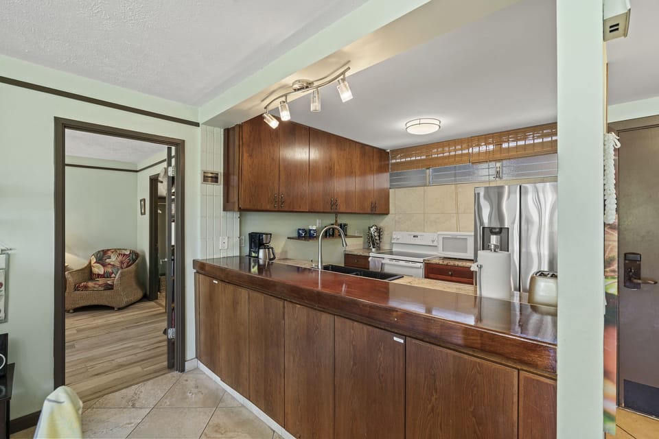 Condo, Multiple Beds, Balcony, Ocean View (Haleakala Shores A-308) | Private kitchen | Coffee/tea maker, electric kettle, dining tables