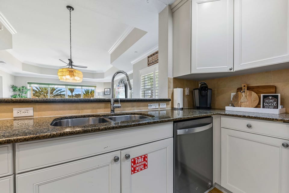 Stylish kitchen with stainless-steel appliances and plenty of counter space.