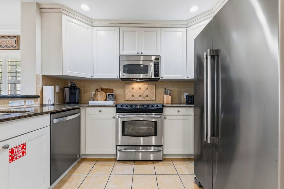Stylish kitchen with stainless-steel appliances and plenty of counter space.