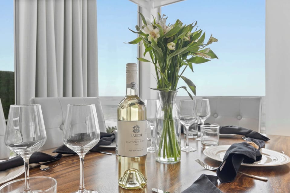 Dining Table — Wine, Fresh Flowers & Ocean Views