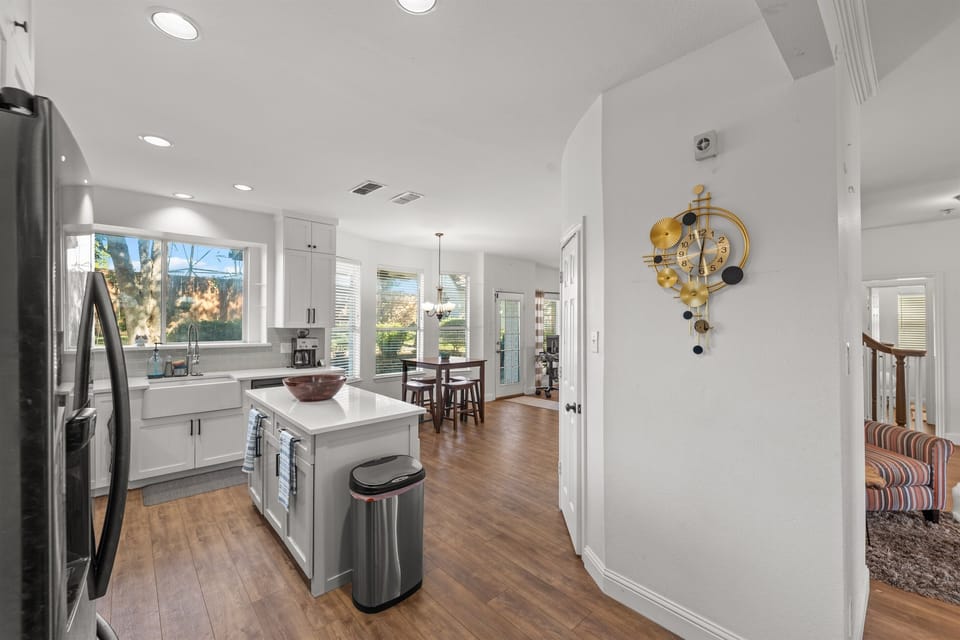 Clean, welcoming kitchen with modern appliances and plenty of counter space.