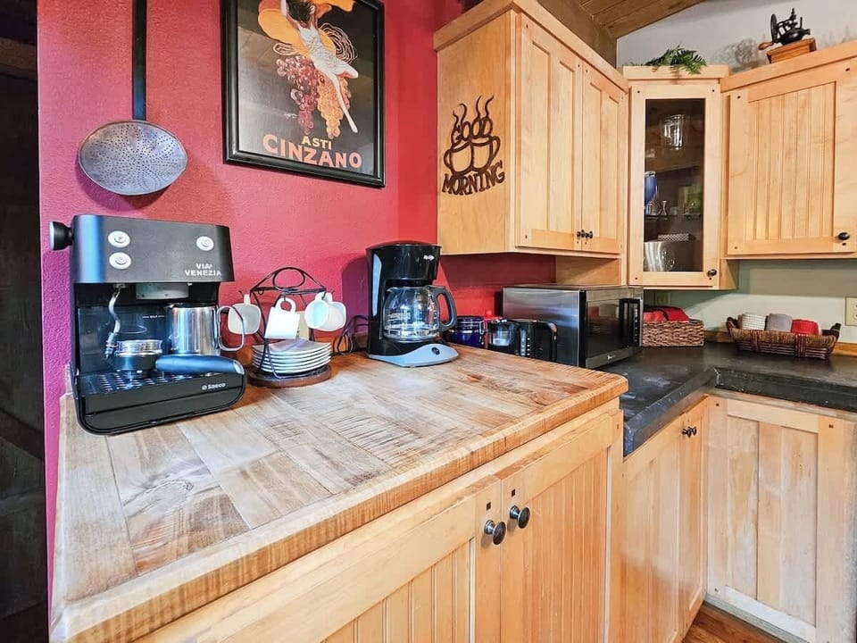 Coffee Station with Espresso Maker, Drip Coffee Maker, French Press, Grinder and Fresh Coffee Beans.  Teas and Cocoa also available.