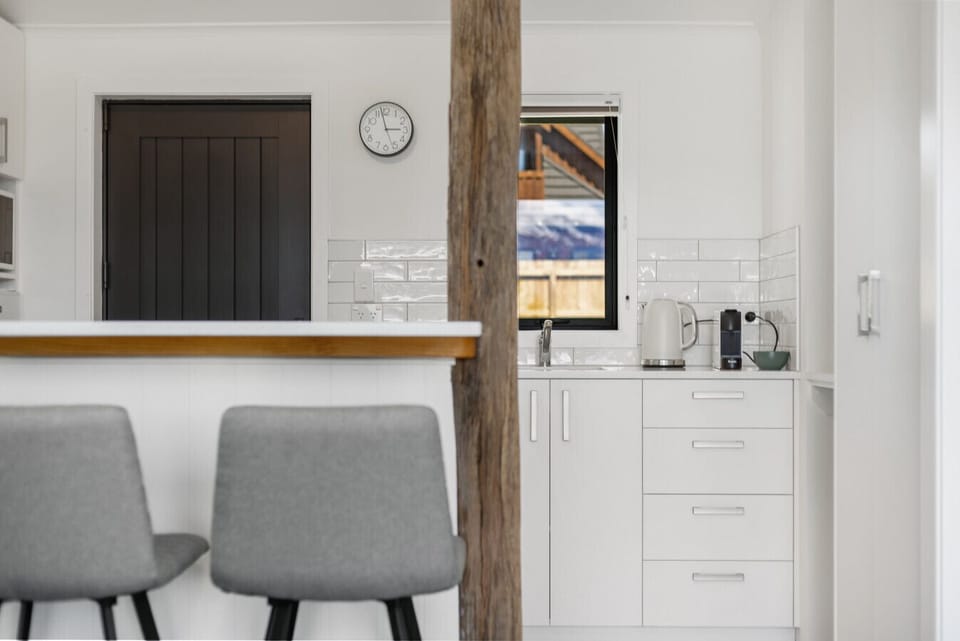 Stylish kitchen bar nook with timber post detail - a warm, characterful touch