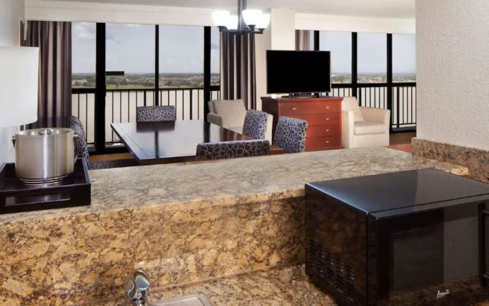 Gather for meals and games around the large dining table.
