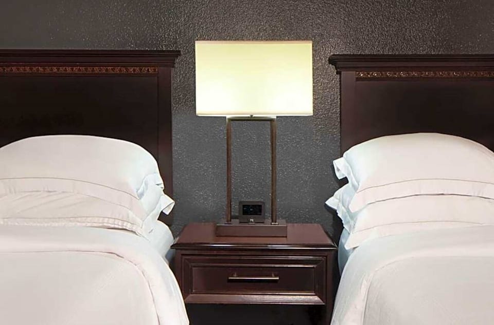 Settle in with bedside lighting and easy nighttime charging access.