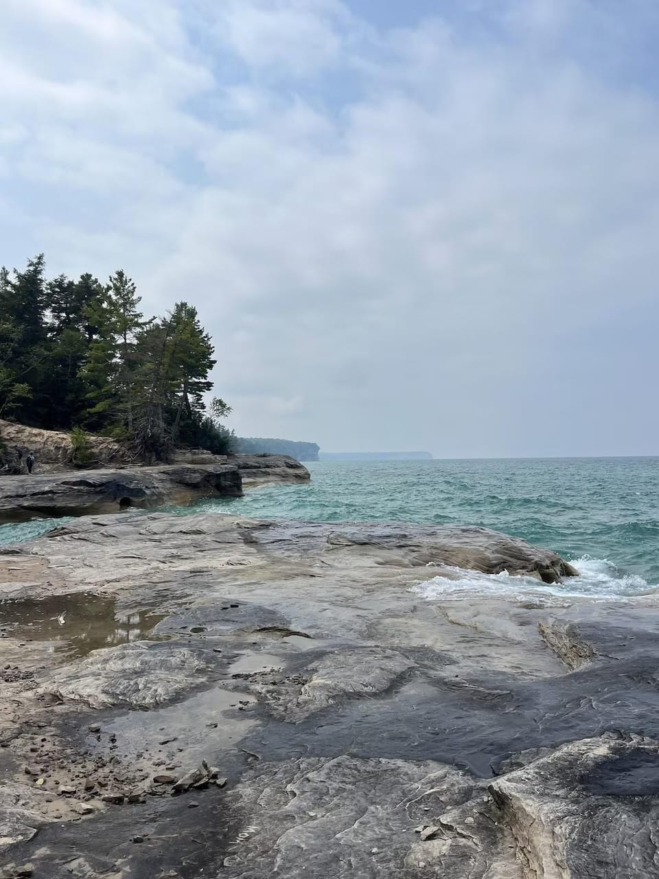 Secluded rocky shoreline with tranquil ocean views