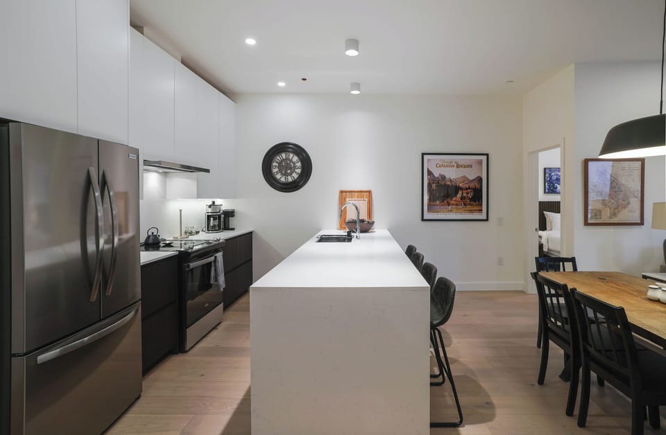 Mackenzie Mountain Hop (Unit 2403) | Private kitchen | Full-size fridge, microwave, oven, stovetop