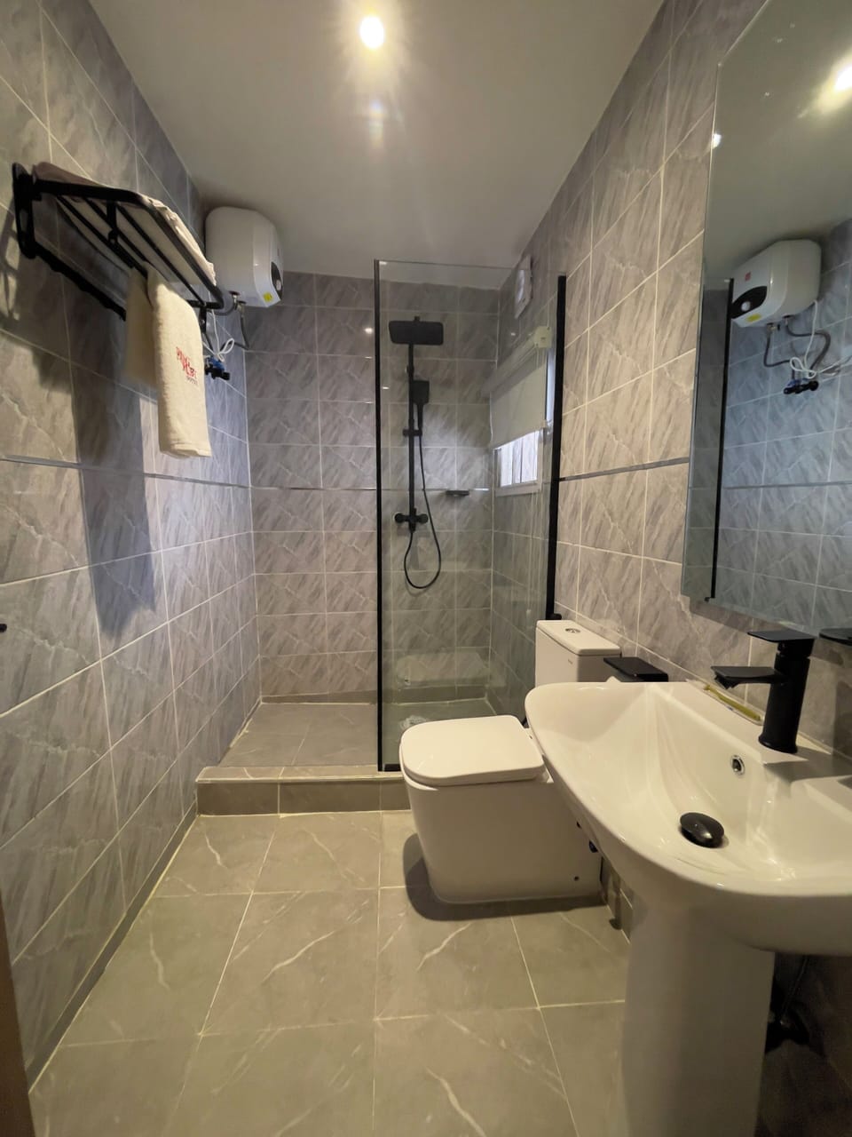 Shower, towels, soap, shampoo